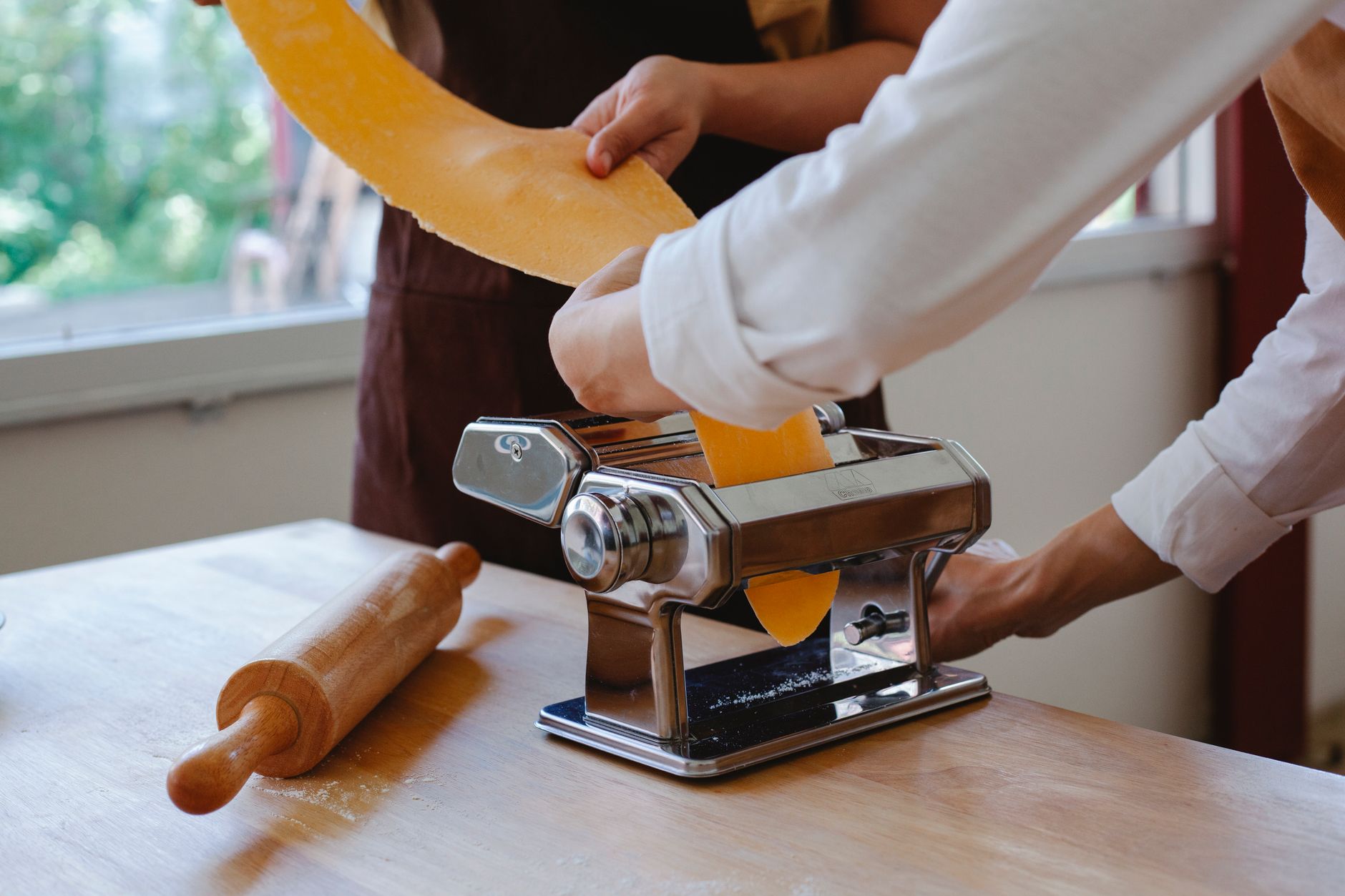 Osteria Nonna pasta maker rolling fresh pasta